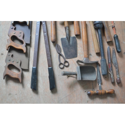 374 - Selection of vintage tools, including saws, seed drillers, edging tools etc.