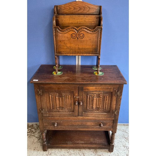 1144 - 20th century oak side cabinet, two linenfold panel doors and a drawer, on turned supports with under... 