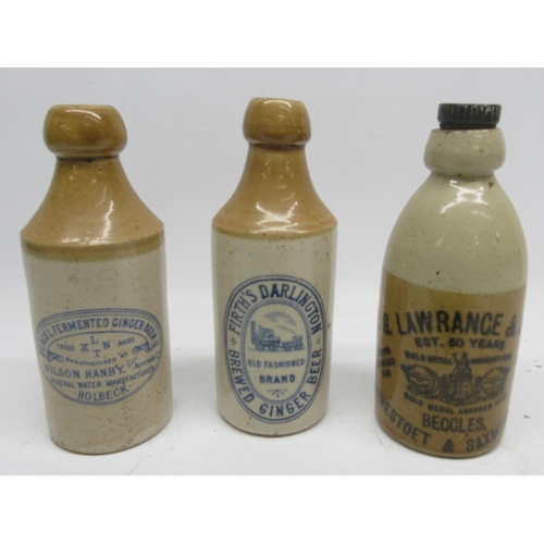 213A - Three stoneware ginger beer bottles, including Firth's of Darlington and H. G. Lawrence and Sons