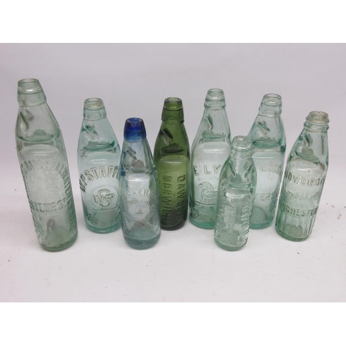 220A - Selection of eight Codd-neck glass bottles from across Britain, including Bolton, Denton, Lincoln et... 