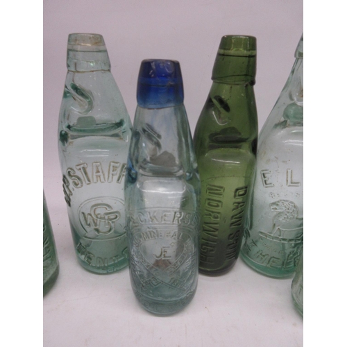 220A - Selection of eight Codd-neck glass bottles from across Britain, including Bolton, Denton, Lincoln et... 