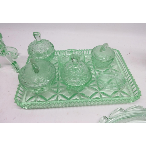 82 - Collection of c1930s Bagley and other uranium glass, incl. dressing table pots and trays, candlestic... 