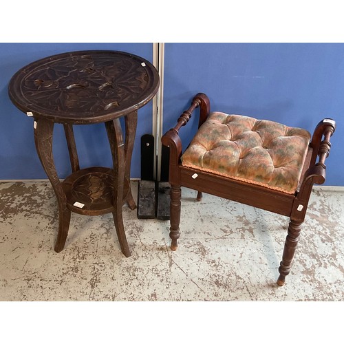 1142 - Edwardian mahogany piano stool with upholstered lifting seat on turned supports, and a carved two ti... 