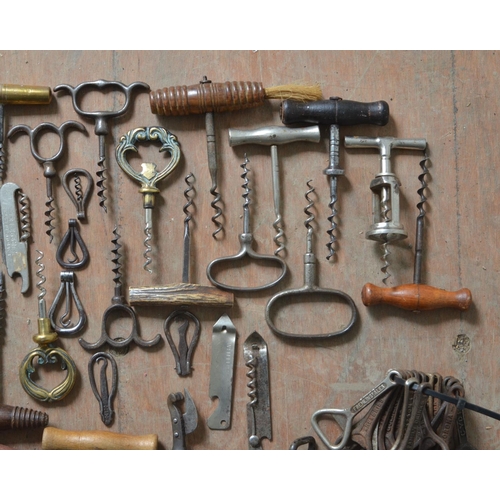 384 - Collection of vintage corkscrews, bottle openers and can openers. Qty