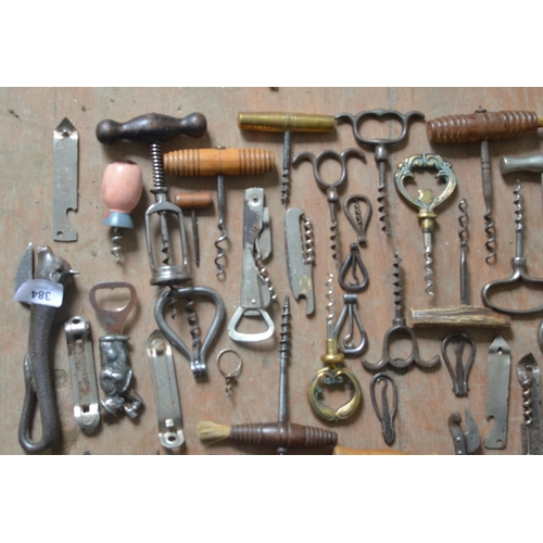 384 - Collection of vintage corkscrews, bottle openers and can openers. Qty