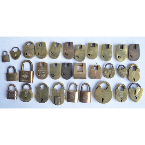 387 - Thirty small and medium sized mostly vintage brass and steel padlocks, no keys