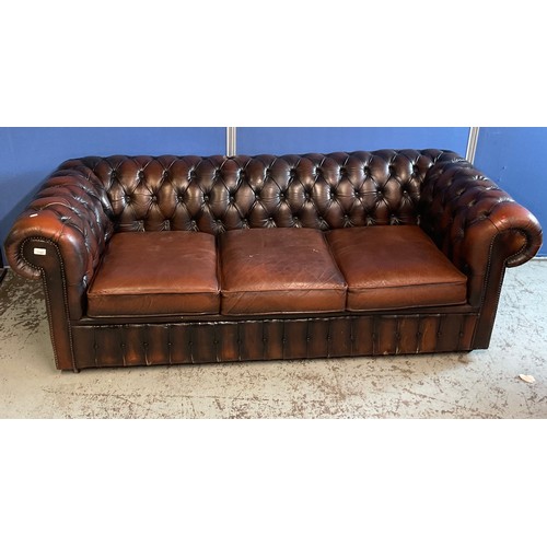 1141 - Deep buttoned brown leather Chesterfield sofa with three loose seat cushions, W200cm D87cm H70cm and... 