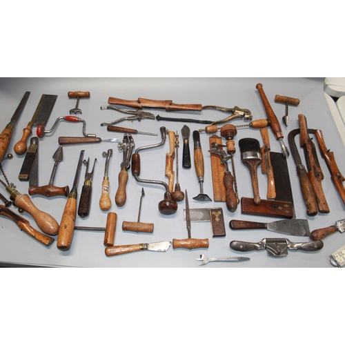 297 - Large collection of tools for various tradesmen, Saw's, chisels, set squares, draw planes etc.