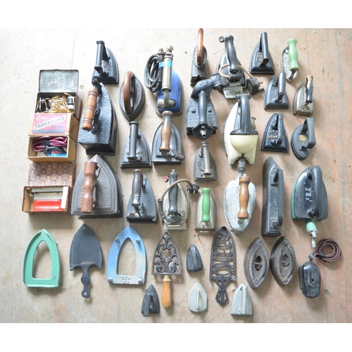 389 - Collection of vintage irons and iron rests (Qty)