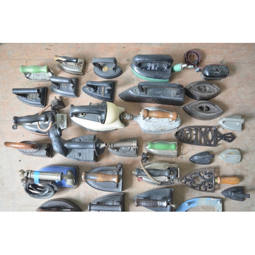 389 - Collection of vintage irons and iron rests (Qty)