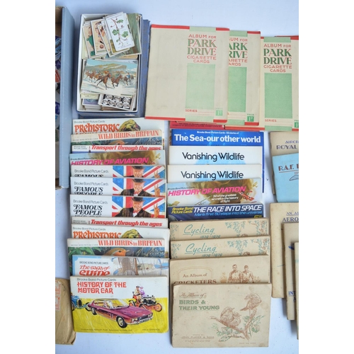 390C - Collection of stamps and picture card books (mostly filled) including Park Drive, John Player and Br... 