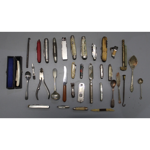 300B - Collection of small pocket knives, cigar cutters, mustard spoons, and a miniature cut throat razor i... 