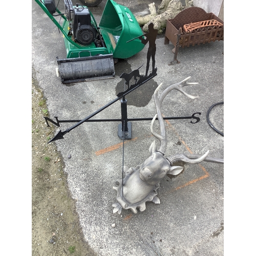 1310 - Cast metal weather vane depicting gun dog and hunter and plastic stag head