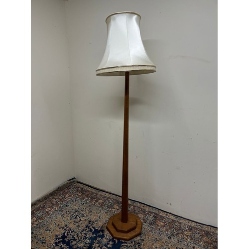 725 - 20th century oak standard lamp, octagonal tapering column on stepped base, with shade, H195cm