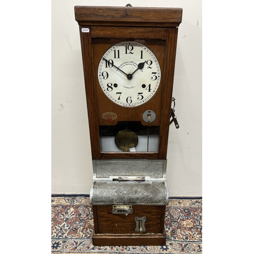 629 - Time Recorder Supply & Maintenance Co., Ltd., 157/159 Borough High Street, London 20th century oak c... 