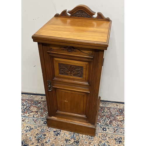 726 - Victorian walnut bedside cupboard, scroll back with carved panel door, W41cm D37cm H92cm