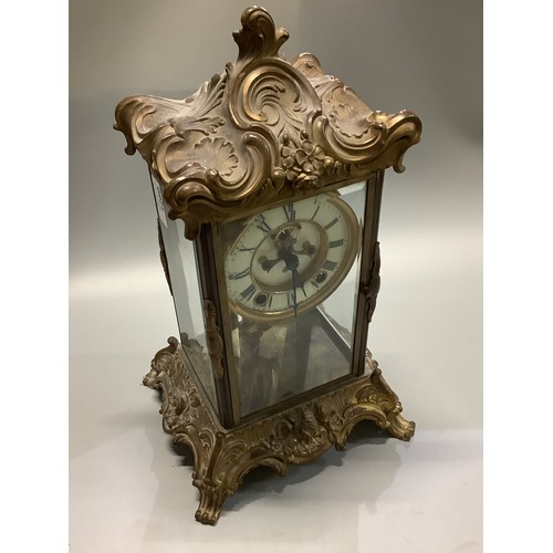 1260 - Ansonia Clock Co., New York, 20th century brass Rococo style four glass mantel clock, signed stepped... 