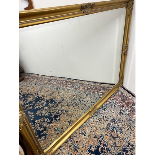 722 - Large Victorian style gilt framed rectangular overmantel mirror, W135 H105cm