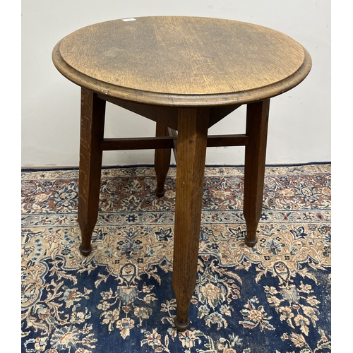 729 - 20th Century oak pub table, circular moulded top on four square supports, marked Miroc Finish, D61cm... 