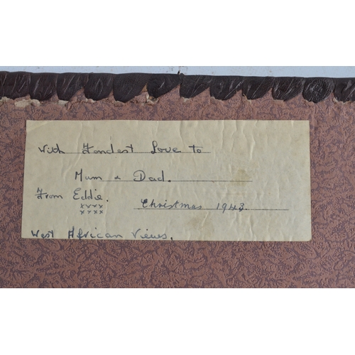 696 - WWII interest - soldier's West African photograph album dated 1943, containing approx. 50 topical ph... 