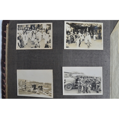 696 - WWII interest - soldier's West African photograph album dated 1943, containing approx. 50 topical ph... 