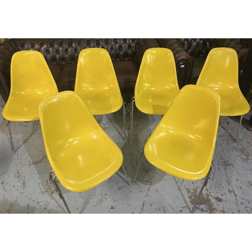 618 - Six vintage Eames for Herman Miller yellow fibreglass and chrome plated DSS stacking chairs, moulded...