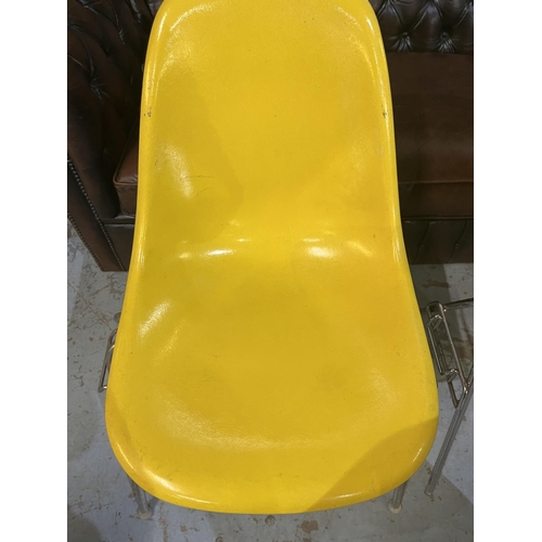 618 - Six vintage Eames for Herman Miller yellow fibreglass and chrome plated DSS stacking chairs, moulded... 