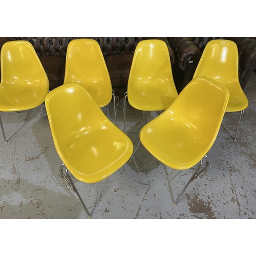 619 - Six vintage Eames for Herman Miller yellow fibreglass and chrome plated DSS stacking chairs, moulded... 