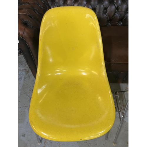 619 - Six vintage Eames for Herman Miller yellow fibreglass and chrome plated DSS stacking chairs, moulded... 