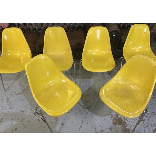 620 - Six vintage Eames for Herman Miller yellow fibreglass and chrome plated DSS stacking chairs, moulded... 