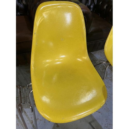 620 - Six vintage Eames for Herman Miller yellow fibreglass and chrome plated DSS stacking chairs, moulded... 