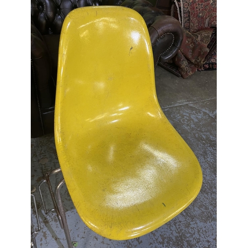 620 - Six vintage Eames for Herman Miller yellow fibreglass and chrome plated DSS stacking chairs, moulded... 