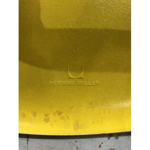 621 - Four vintage Eames for Herman Miller yellow fibreglass and chrome plated DSS stacking chairs, moulde... 