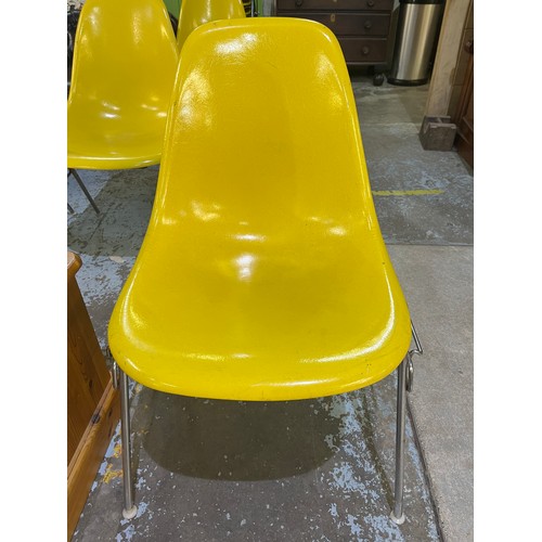 622 - Vintage Eames for Herman Miller yellow fibreglass and chrome plated DSS stacking chair, moulded mark... 