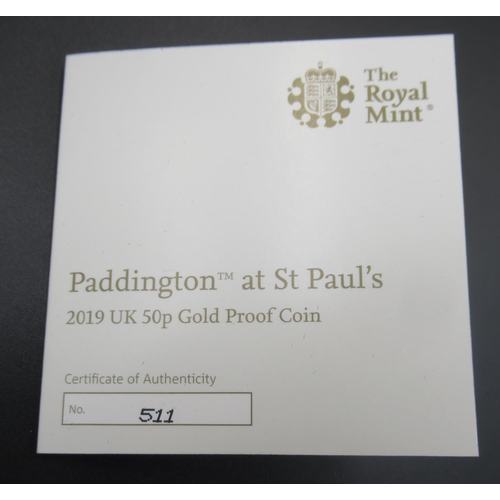 1060 - The Royal Mint - Paddington at St. Pauls 2019 UK 50p 22ct Gold Proof Coin, No. 511/600, with COA, in... 