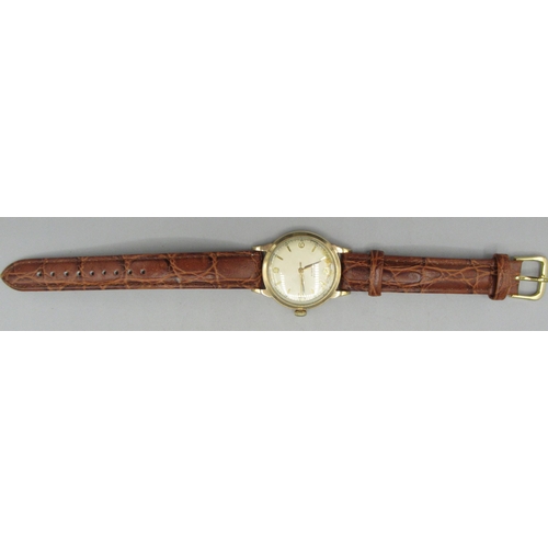 1028 - Baume 9ct gold wristwatch, signed parchment coloured dial, applied Arabic and baton hour indices, ce... 