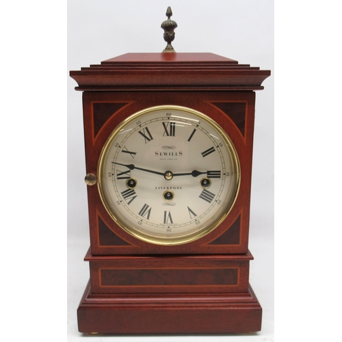 1120 - Sewills Liverpool - mahogany cased bracket clock, stepped case with brass urn finial, cream Roman di... 