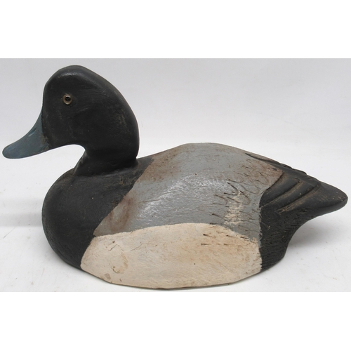 1104 - Large painted wooden decoy duck, black grey and white plumage, with glass eyes, initialled VAN on ba... 