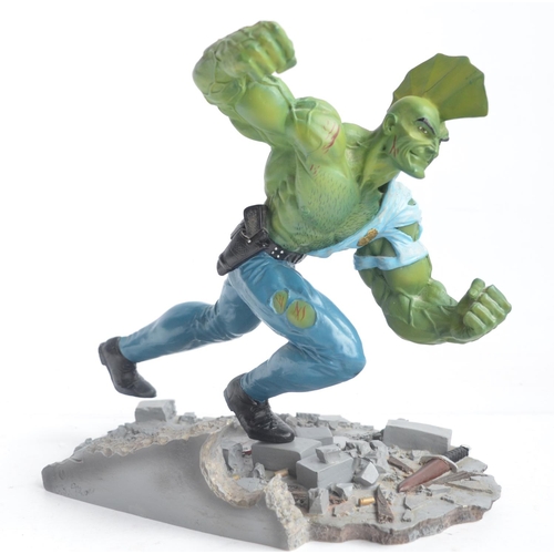 Erik Larson 9" 1/8 scale The Savage Dragon cold cast porcelain statuette in diorama setting from Image, sculpted by Clayburn Moore, limited edition 1398/2000 in excellent previously displayed and slightly dusty condition, rear foot attachment epoxy not used, box fair/good with storage wear