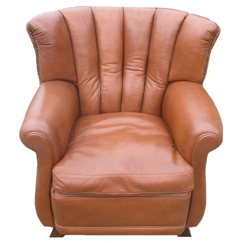 1320 - Brown leather upholstered arm chair, pleated bow back, and scroll arms with loose seat cushion on an... 