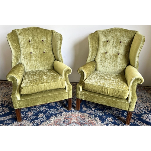 1307 - Pair of George 111 style wing back arm chairs, serpentine shaped button backs and scroll arms on mou... 