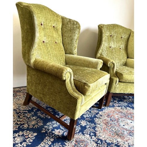 1307 - Pair of George 111 style wing back arm chairs, serpentine shaped button backs and scroll arms on mou... 