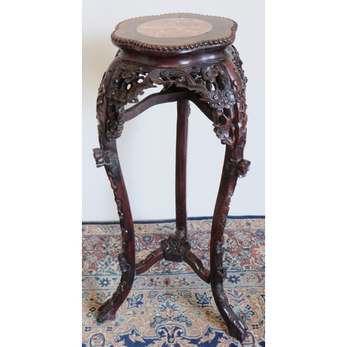 1324 - Japanese Meiji period hardwood jardiniere stand, with inset marble top and floral carved pierced fri... 