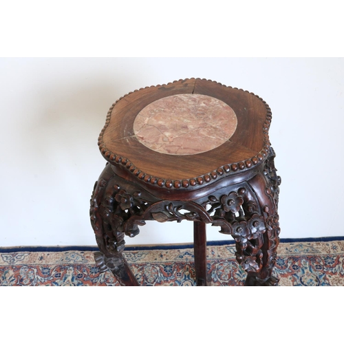 1324 - Japanese Meiji period hardwood jardiniere stand, with inset marble top and floral carved pierced fri... 