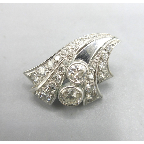 1001 - French Art Deco platinum and 18ct white gold fan-shaped clip on earrings, set with two large old cut... 