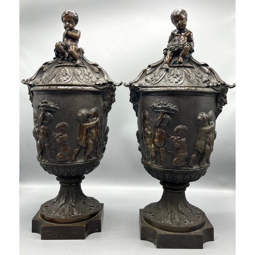 1181 - Pair of 19th century bronze urn shaped vases, bodies relief decorated with harvesting putti and saty... 