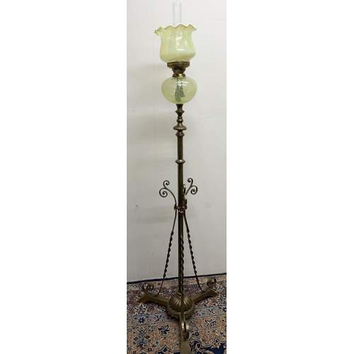 1140 - Arts and Crafts brass floor standing oil lamp, in the manner of W.A.S. Benson, adjustable column wit... 