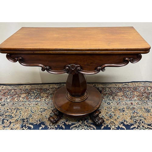 1338 - William 1V mahogany tea table, rectangular swivel folding top on faceted vase column support and cir... 