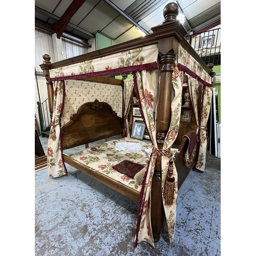 1309 - Victorian style pine four poster bed, turned column supports with moulded cornice and arched head an... 