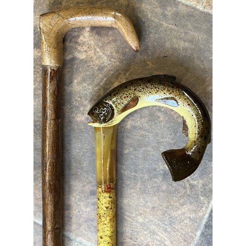 1107 - Craftsman made stick, horn handle shaped and painted as a Rainbow Trout, L115cm, another stick with ... 